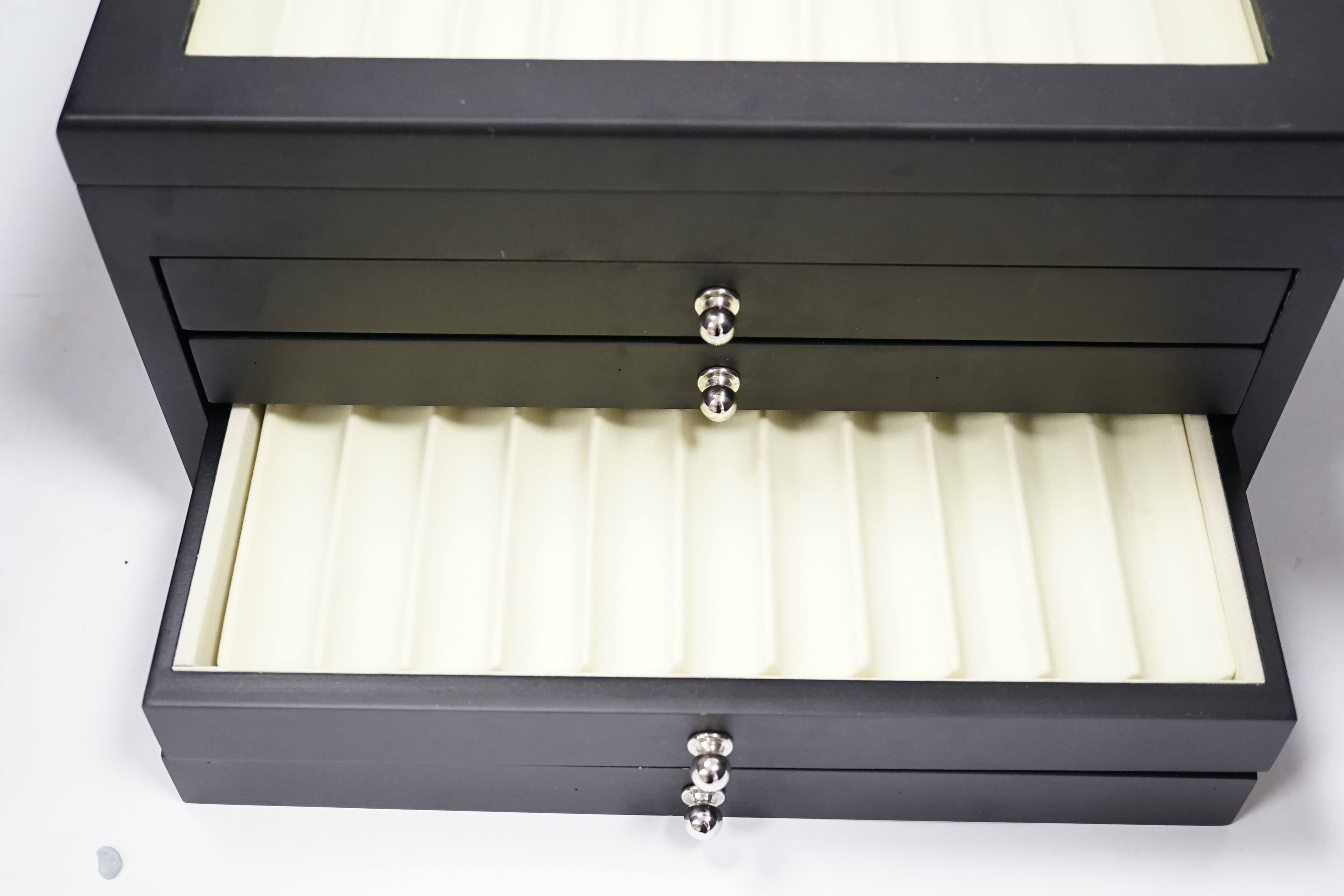 A fountain pen collectors' case in ebony finish, for fifty six pens